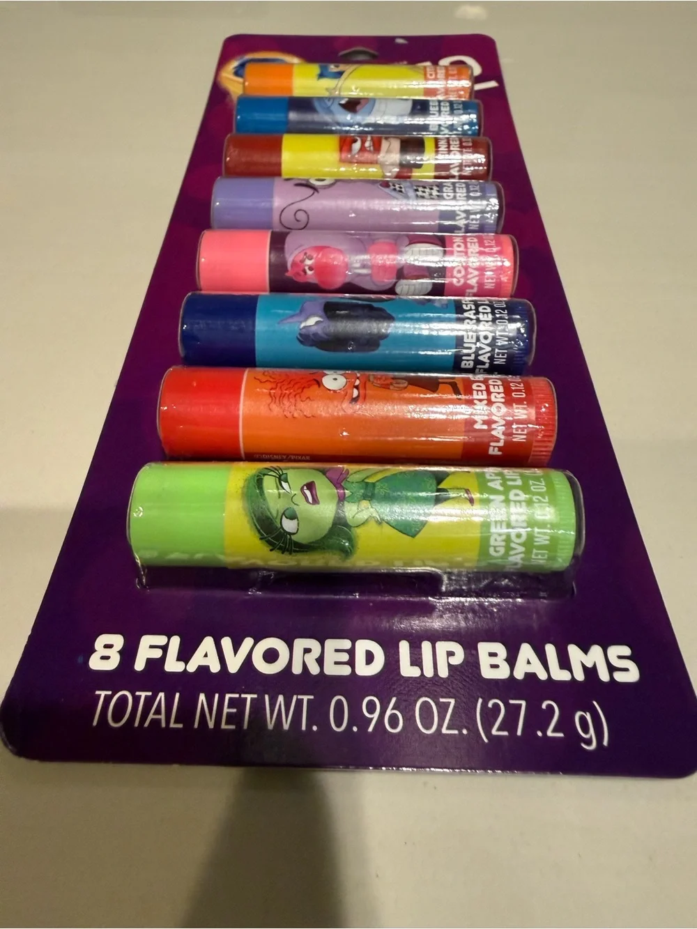 Disney pixar inside out 2 - 8 flavored lip balms apple berry cotton candy grape